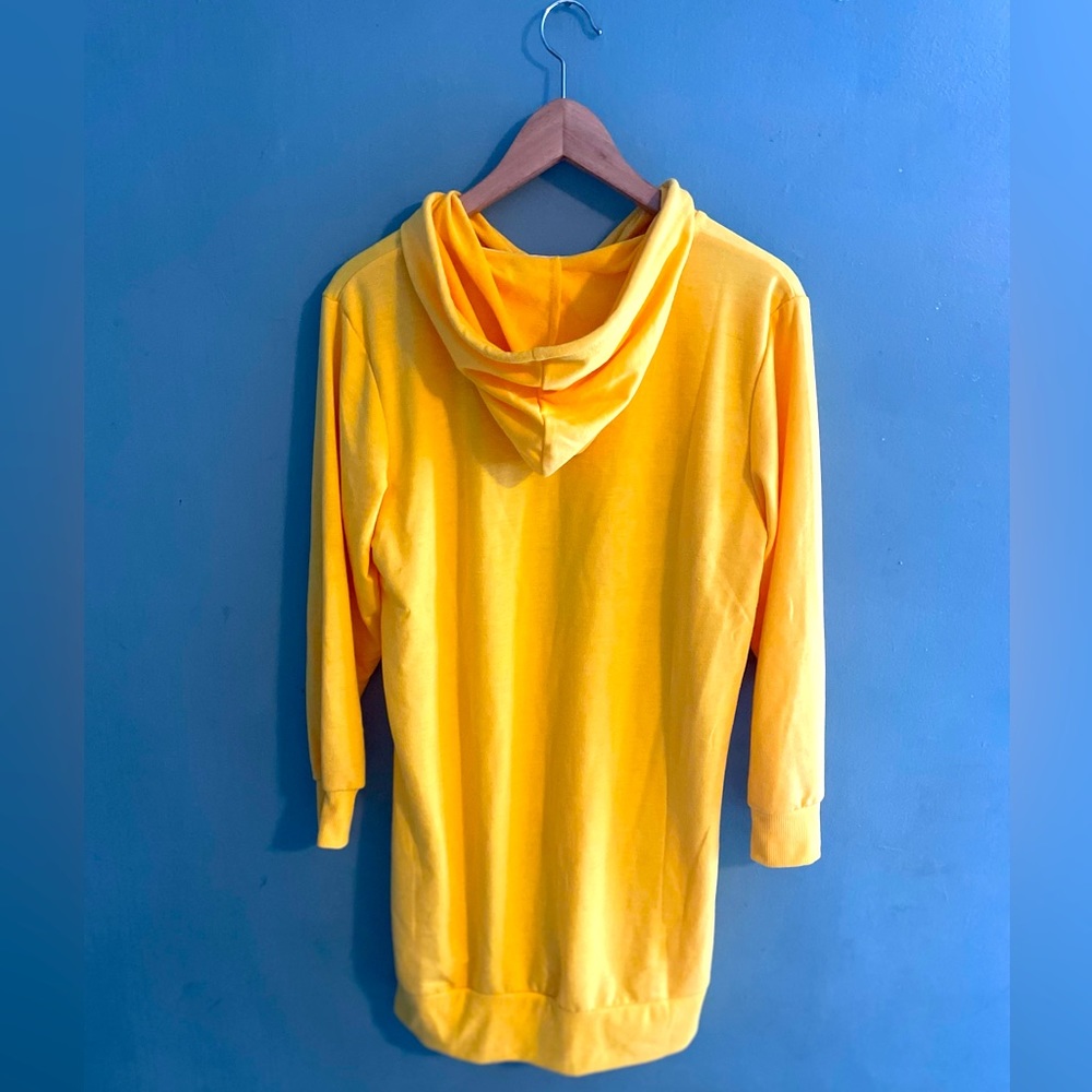 Bright yellow sweatshirt dress. Perfect for fall weather and boots.